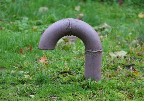 buried thin metal plate in front of house|What Is The Old Metal Pipe Sticking Out Of The Ground In .